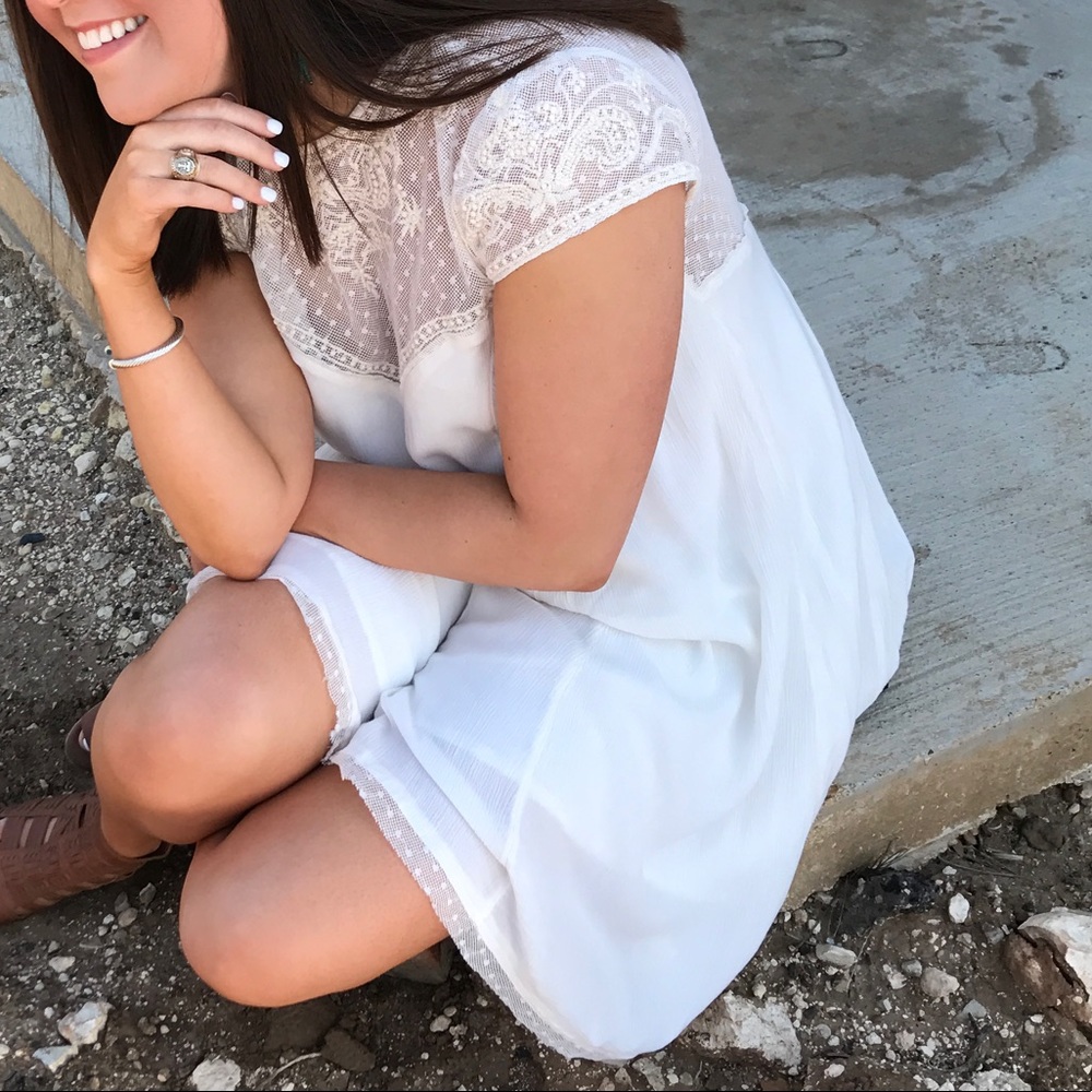 cream dress with mesh sweetheart neckline